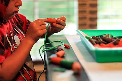 Stringing beads or pasta activity