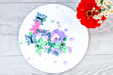 Bug collage on a paper plate